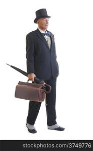 Middle aged businessman in a retro business suit with valise and umbrella isolated on white