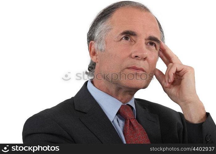 Middle-aged businessman searching for inspiration