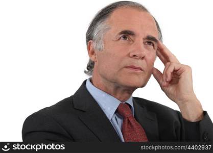 Middle-aged businessman searching for inspiration