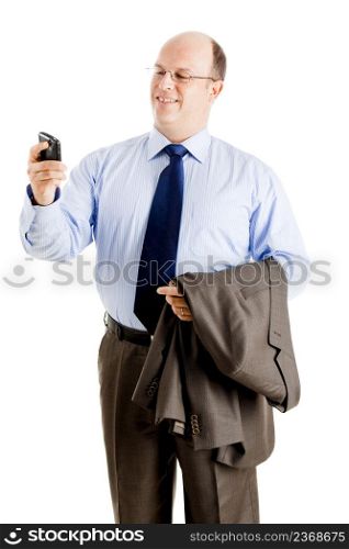 Middle-aged businessman sending a text message, isolated on white background