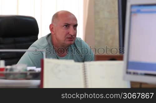 Middle-aged businessman working in the office