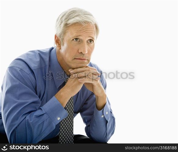 Middle aged Caucasian man with thoughtful expression.