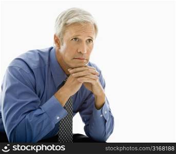 Middle aged Caucasian man with thoughtful expression.