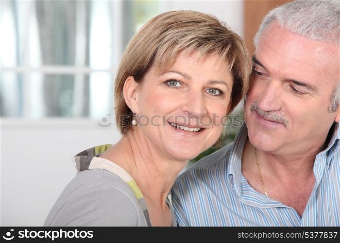 Middle-aged couple at home