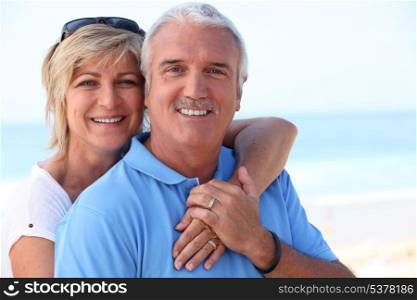 Middle-aged couple at the coast