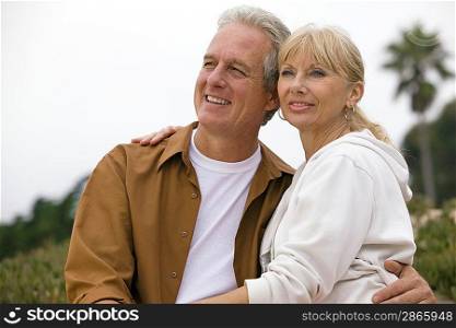 Middle-aged couple embracing