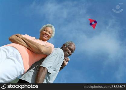 Middle-Aged Couple Flying Kite