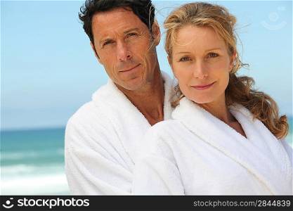 Middle-aged couple in bathrobe