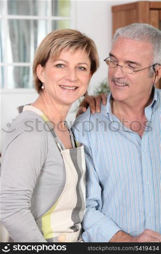 Middle-aged couple in kitchen