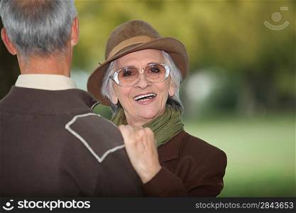 Middle-aged couple in park