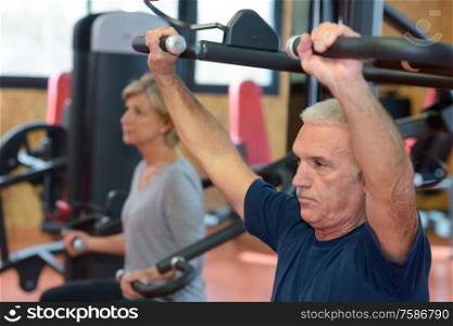 middle-aged couple in the gym