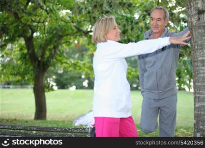 Middle-aged couple jogging
