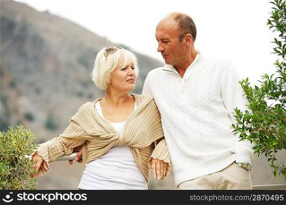 Middle-aged couple outdoors