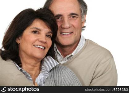 Middle-aged couple stood together