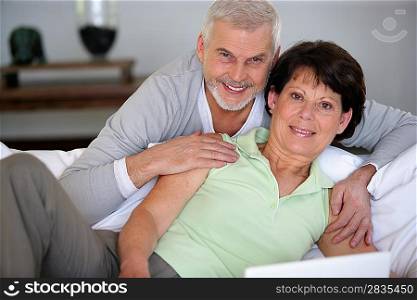 Middle-aged couple using a computer