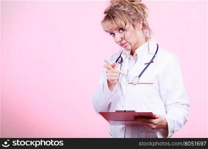 Middle aged female medical doctor.. Female medical doctor in white professional uniform apron with blue stethoscope on her neck. Middle aged woman pharmacist nurse.