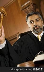 Middle-aged judge forming sentence