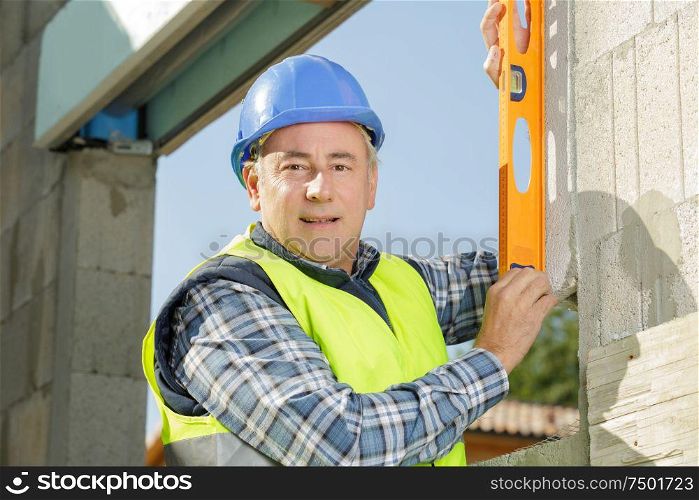 middle aged land surveyor working outdoors