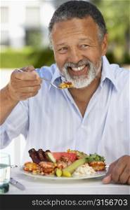 Middle Aged Man Dining Al Fresco