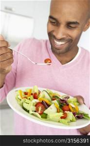 Middle Aged Man Eating Healthy Salad