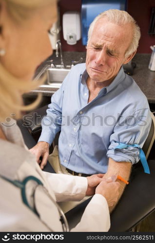 Middle Aged Man Having Blood Test Done