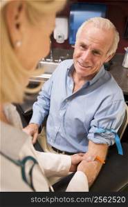 Middle Aged Man Having Blood Test Done