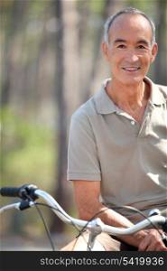 Middle-aged man riding bike