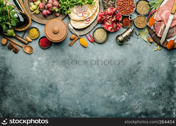 Middle eastern or arabic tradition ingredients - kebab bread, meat, wine, herbs and spices. Space for text, flat lay