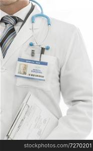 Midsection of doctor in labcoat with identity card holding clipboard at clinic