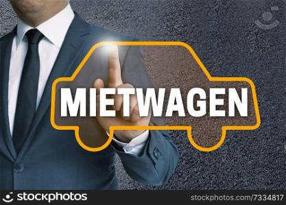 mietwagen (in german rental car) touchscreen is operated by businessman concept