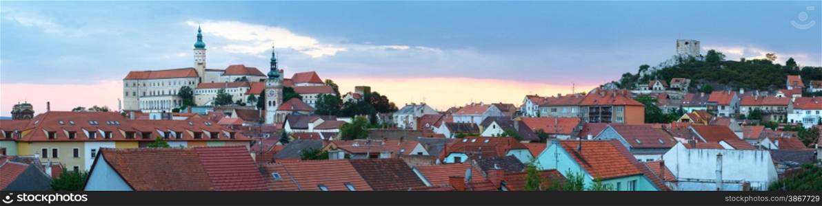 Mikulov town sunset top view (Moravian Region, Czech Republic). The Old town centre and castle (reconstruction in 1719-1730). Panorama.