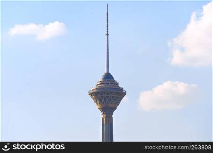 Milad Tower with blue sky and clouds in the dayime. Tehran, Iran