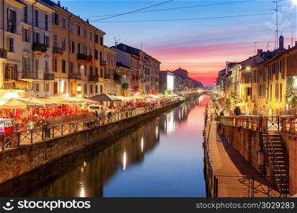 Milan. Canal Naviglio Grande at sunset.. Scenic view of the Navigio Grande Canal at sunset. Milan. Italy.