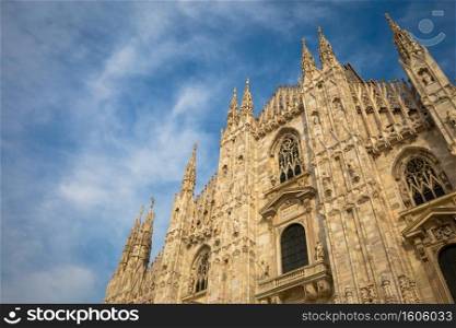 Milan Cathedral  Duomo di Milano  with copy space for text. Blue sky background and sunset light.