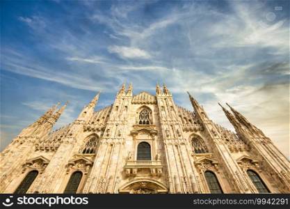 Milan Cathedral  Duomo di Milano  with copy space for text. Blue sky background and sunset light.