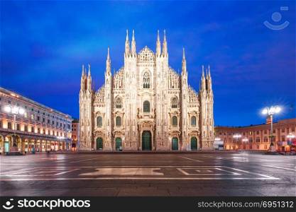 Milan Cathedral on Piazza del Duomo, Milan, Italy. Piazza del Duomo, Cathedral Square, with Milan Cathedral or Duomo di Milano during morning blue hour, Milan, Lombardia, Italy
