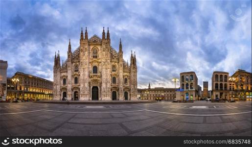 MILAN, ITALY - JANUARY 13, 2015: Duomo di Milano (Milan Cathedral) and Piazza del Duomo in Milan, Italy. Milan's Duomo is the second largest Catholic cathedral in the world.