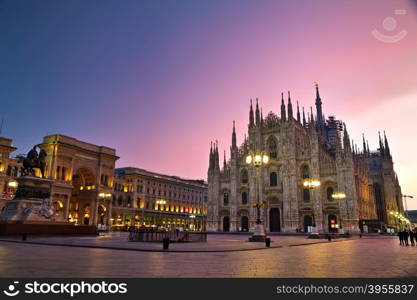 MILAN, ITALY - NOVEMBER 25: Duomo cathedral with people early in the morning on November 25, 2015 in Milan, Italy.