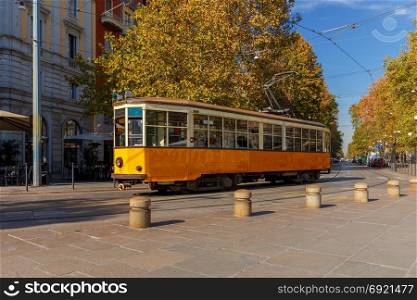 Milan. Old tram.. Old Historic yellow tram on the street of Milan. Italy.