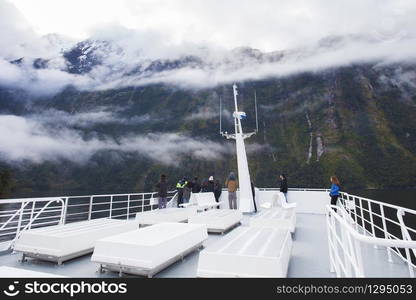 MILFORDSOUND NEW ZEALAND - AUGUST 30 : tourist looking to beautiful of milfordsound scenic ,nature cruise most popular for visitor in new zealand on august30 , 2015 in south island new zealand