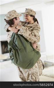 Military Couple Greeting Each Other On Home Leave