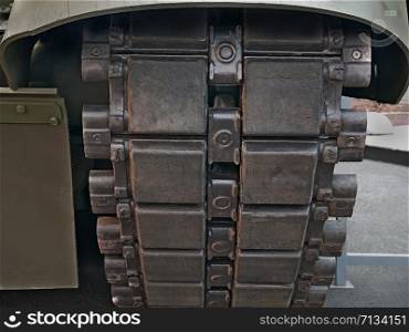 Military equipment; undercarriage of tank caterpillar tracked wheel; close-up