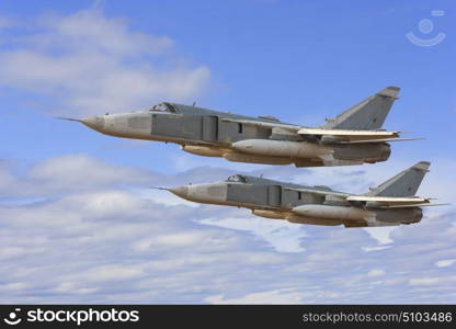 Military jet bomber Su-24 Fencer flying above the clouds.. Military jet bomber Su-24 Fencer flying above the clouds