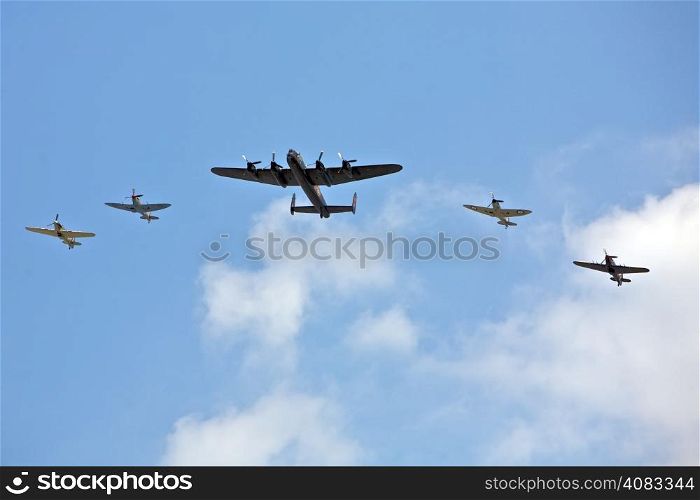 Military Planes Flying at an air Show. Five Planes in Precision Flight Formation and Sequence