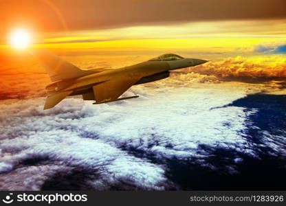 militry plane flying over cloud scape
