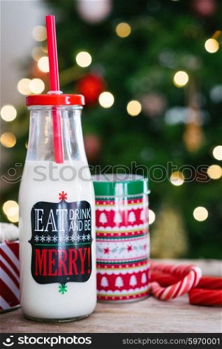 Milk for santa in a jar with christmas cookies