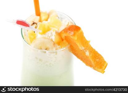 milk fruit cocktail with slice of orange cream and pipe