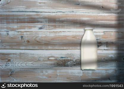 Milk on bottle in Creative conceptual top view flat lay composition with copy space isolated .