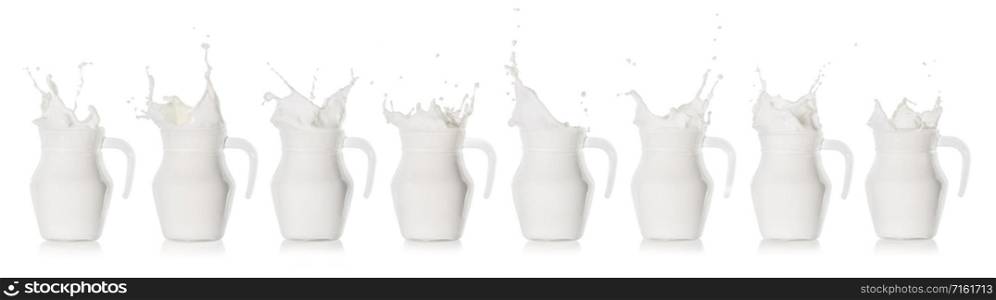Milk splash in a glass jug isolated on white background. Collection, set. Milk splash in a glass jug