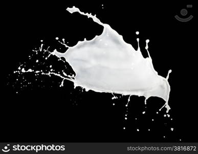 milk splash isolated on black background